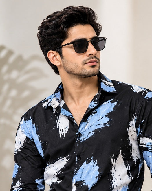 AI-generated model editorial view of the black blue white abstract print shirt; confirm garment details before publishing